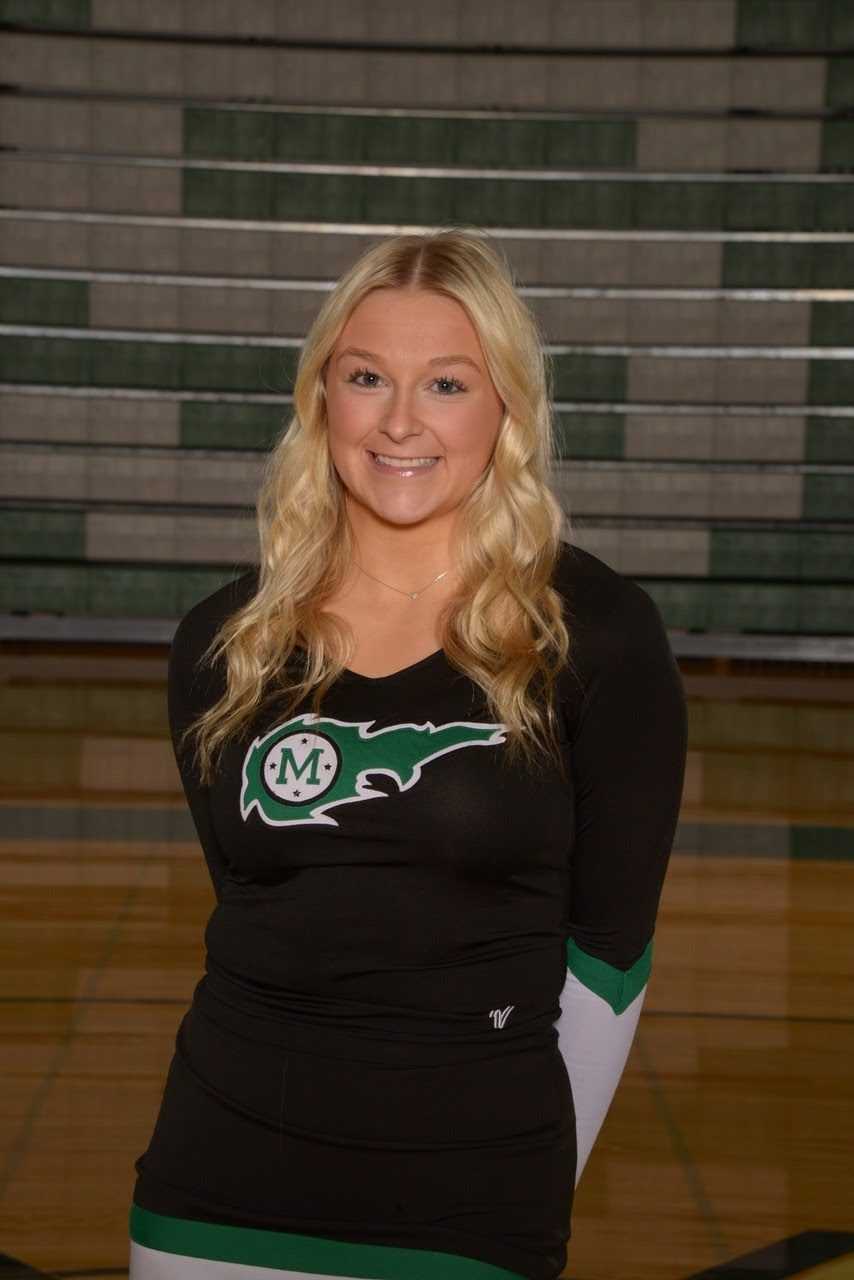 Caroline is a senior on the Mason Winter Cheer Team.